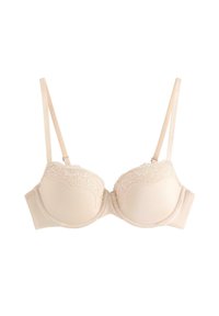 Beige pehmeä rintaliivi, jossa on pitsiyksityiskohtia yläkupeissa, säädettävät olkaimet ja sujuva, saumatonta kangasta mukavuutta varten.