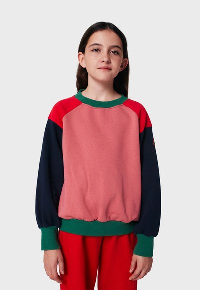 Farbenblockierter Pullover in Pink, Rot und Marineblau, mit grünen Akzenten. Verfügt über eine lockere Passform, Rippbündchen und einen Rundhalsausschnitt. Weicher Stoff.