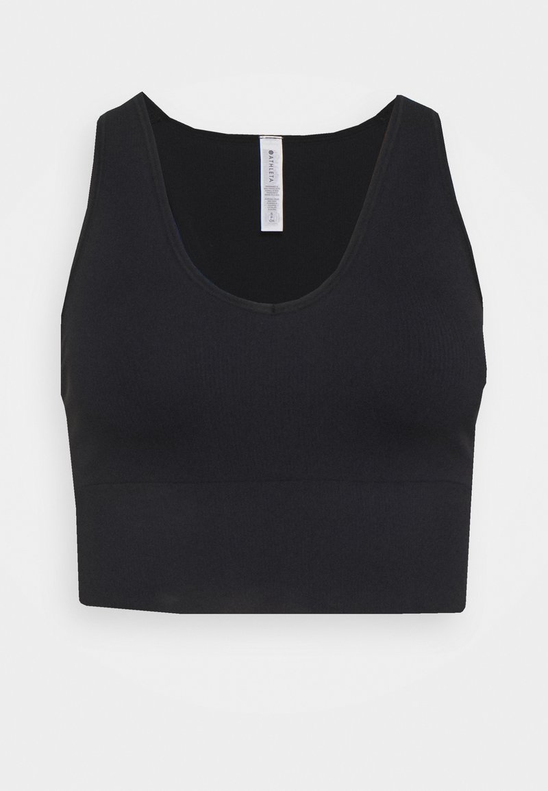 Crop top noir sans couture avec un col rond, fabriqué en tissu extensible. Présente un design ajusté et une texture lisse. Style minimaliste.