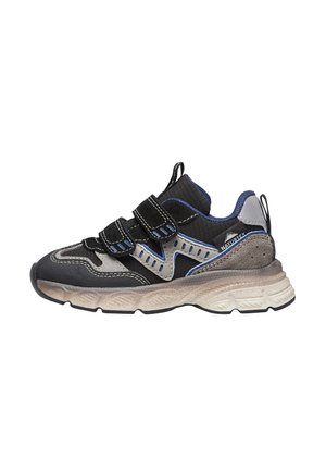 Sneaker nera e grigia con accenti blu, cinturini in velcro, suola spessa beige e etichetta "NATURETEX" sul lato, mostrata in profilo laterale.