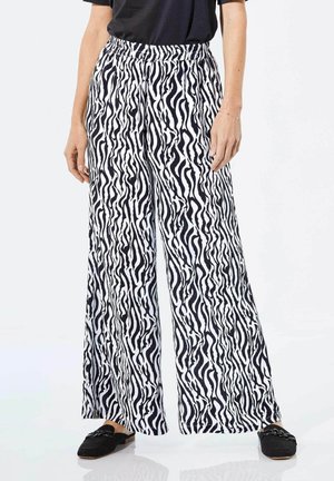 MIT WEITEM BEIN - Broek - black