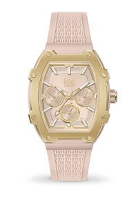 Montre avec un bracelet en silicone rose et un cadran octogonal doré, un cadran texturé rose clair et trois sous-cadrans pour les fonctionnalités de date et d'heure.