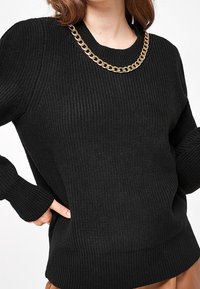 Next Sweter