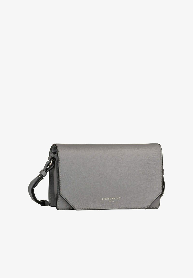 Gray leather crossbody bag, featuring a geometric flap design, soft texture, detachable strap, and gold logo accent.