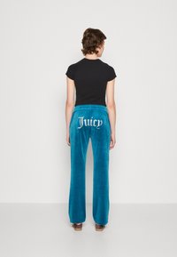 Juicy Couture TINA - Treniņtērpa apakšdaļas - deep lagoon