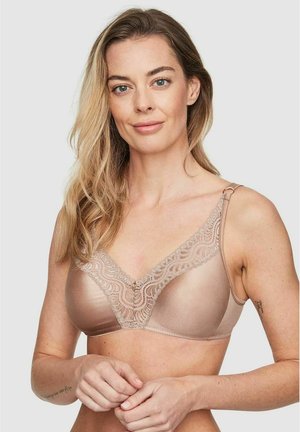Beige beha met kantafwerking, v-halsontwerp en verstelbare bandjes. Beschikt over een decoratief detail in het midden en een gladde textuur.