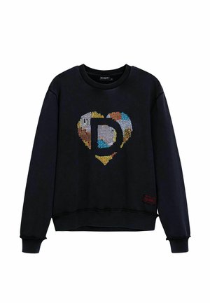 Sudadera negra con un corazón bordado a color con una 'D' en el centro. Cuello redondo y puños acanalados, ajuste holgado, textura suave.