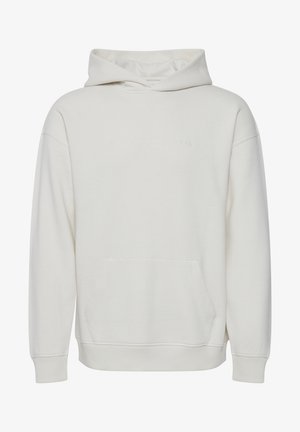 Helle beigefarbene Kapuzenjacke mit einer vorderen Tasche, gerippten Bündchen und Saum. Mit geprägtem Textdesign auf der Brust. Weiche, glatte Textur.