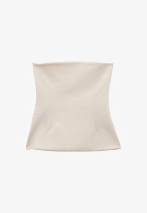 Beige bodysuit med et glat, strækbart materiale. Har et tætsiddende design og rene linjer, med to lodrette syninger for struktur.