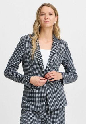 Námornícky modrý a biely houndstooth blazer s priliehavým strihom. Obsahuje zárezové klopy, dve predné vrecká a zapínanie na jeden gombík. Textúrovaná tkanina.
