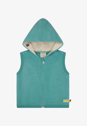 Türkiser Wollweste mit Reißverschluss vorne und Kapuze. Innenausstattung mit cremefarbenem Futter und schwarzen Tiermotiven. Etikett an der Seite.