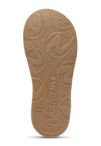Soletta in gomma marrone con una superficie liscia, caratterizzata da un motivo a logo circolare e con il nome del marchio inciso, oltre a un'indicazione della taglia.