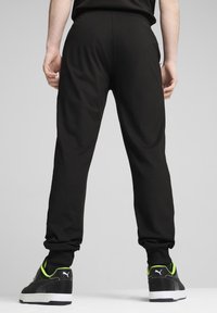 Puma MERCEDES-AMG PETRONAS F1 CLOUDSPUN - Tréningruha alsók - black