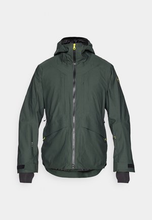 Veste vert foncé avec capuche, fermeture éclair sur le devant, deux grandes poches et accents noirs. Présente un tissu texturé et des poignets renforcés.