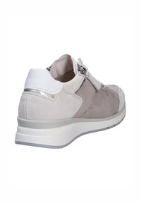 Gray suede sneaker with white leather accents, textured upper, rear zipper, and lightweight rubber sole. Rounded toe and minimal branding.