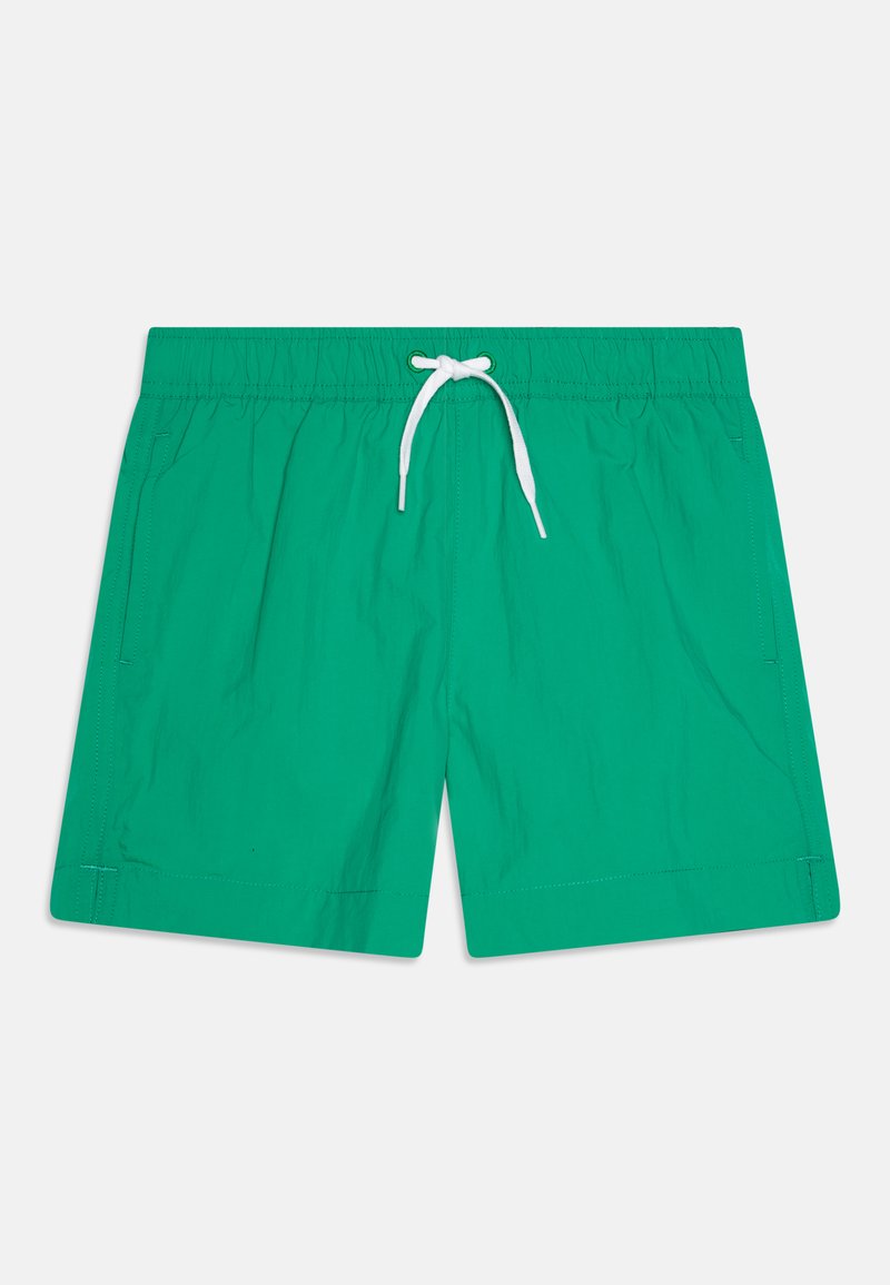 Zöld fürdőnadrág, könnyű anyagból készült, rugalmas derékkal és fehér zsinórral, két oldalsó zsebével és egyszerű dizájnnal.