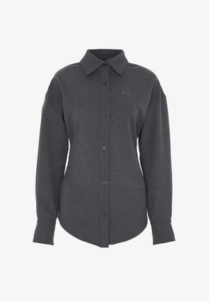 Gray button-up shirt made of textured fabric. Features a classic collar, long sleeves, and a subtle embroidered logo on the chest.