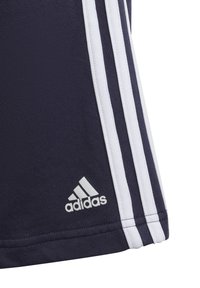 Navy blue athletic shorts with vertical white stripes and an embroidered white Adidas logo near the hem. Textured, breathable fabric.