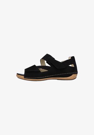 Sandalo nero con punta aperta, due cinturini regolabili e suola imbottita beige con cuciture bianche visibili.