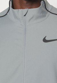 Nike Performance Sportovní bunda - grey