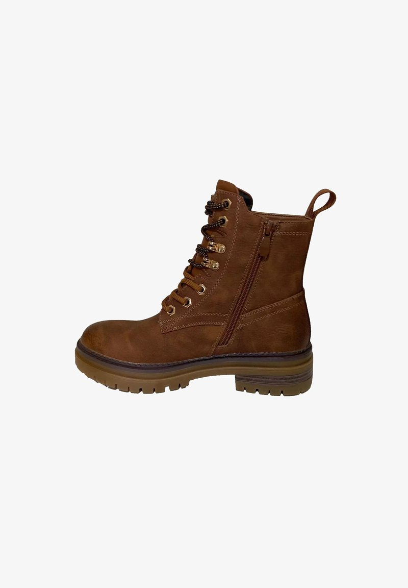 Stivale alla caviglia in suede marrone con cerniera, allacciatura frontale e occhielli dorati. Suola in gomma spessa con un leggero tacco. Anello sul tallone per una facile calzata.