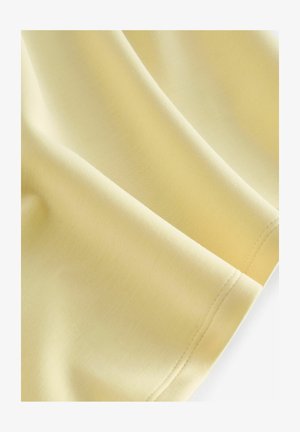 Šviesiai geltona medžiaga, minkštas medvilnės mišinys, sklandžiai krinta su minimaliu blizgesiu. Yra švarūs ir lygūs siūlai palei apdailą.