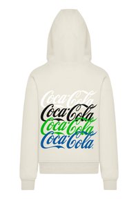 Cream hoodie with "Coca-Cola" text repeated in white, black, green, and blue on the back in a stacked design.