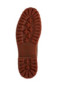 Σόλα καφέ Timberland μποτάκι με βαθιά αυλακώματα και σταυροειδείς τρακτέρ για πρόσφυση. Λογότυπο Timberland ανάγλυφο κοντά στη φτέρνα.