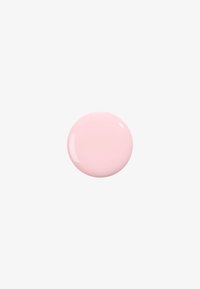 Blank rosa nagellack i en cirkulär droppform, med en jämn textur och jämn färgfördelning utan mönster eller accenter.