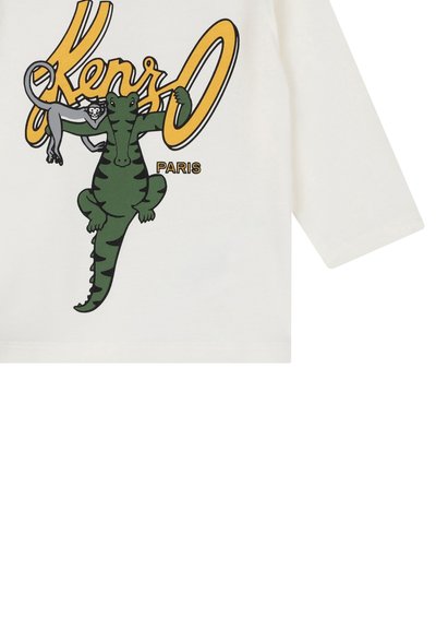 Chemise blanche à manches longues avec un graphisme de crocodile et de singe cartoon verts, avec le texte "Kenzo Paris" en jaune et noir.