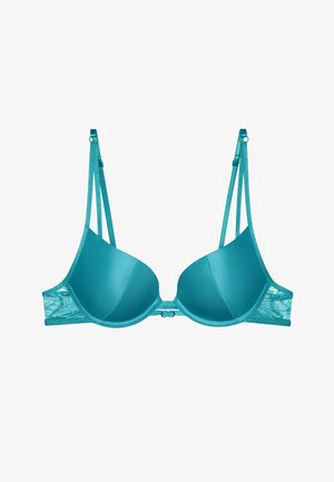 Reggiseno imbottito turchese con pannelli laterali in pizzo e spalline regolabili. Presenta una chiusura con gancio al centro. Texture liscia sulle coppe.