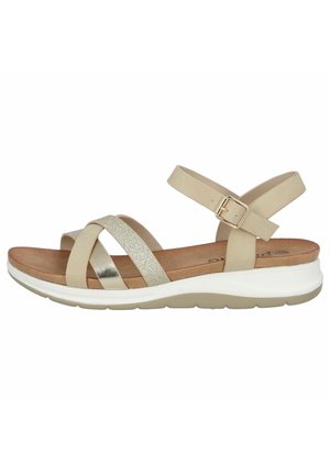 Beige sandal featuring a textured upper with glittery gold accents, adjustable ankle strap, cushioned insole, and a white and gray sole.