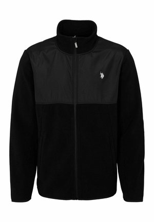 Black fleece jacket with a contrasting black panel, high collar, zip closure, side pockets, and a small logo on the upper left chest.