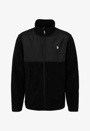 Black fleece jacket with a contrasting black panel, high collar, zip closure, side pockets, and a small logo on the upper left chest.