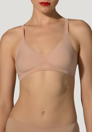 Hellbeige, kabelloser Bralette mit V-Ausschnitt, dünnen Trägern und strukturierten Details auf dem Stoff. Glattes Material mit minimalen Nähten.