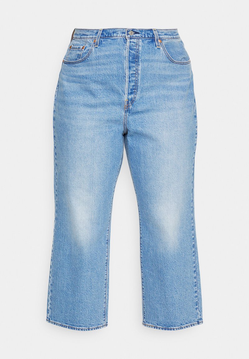 Hellblaue hochgeschnittene Denim-Jeans mit fransen Saum, fünf Taschen und einem Knopfverschluss. Klassisches gerade geschnittenes Design.