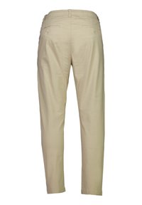 Pantalon beige avec une coupe fuselée, une taille élastique et deux poches arrière. Texture lisse et design simple sans embellissements visibles.