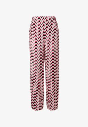 Gepatternde broeken van een lichte stof, met een herhalend bladerenpatroon in roze, zwart en wit, voorzien van een elastische tailleband en brede benen.