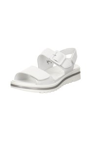 White sandals with a textured upper, two adjustable straps, a closed heel, and a thick white sole with a subtle gray stripe.