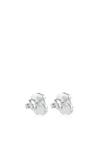 Orecchini a forma di orso in argento con una finitura lucida, caratterizzati da accenti in zirconia cubica trasparente e una chiusura a perno standard per un indossamento sicuro.