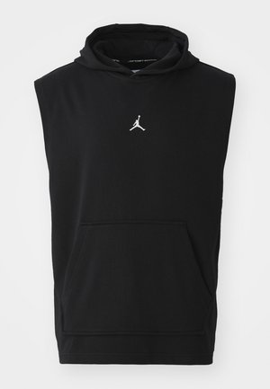 Hoodie sans manches noir en coton, avec une poche avant et un logo Jumpman blanc sur la poitrine. Texture lisse, design décontracté.
