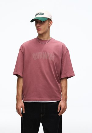 Nyomott mintás póló - light red