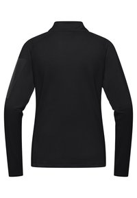 Zwart shirt met lange mouwen, een textuurafwerking, hoge kraag en een glad paneel accent nabij de schouder. Eenvoudig en getailleerd ontwerp.