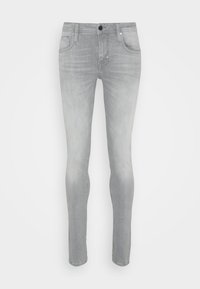 Grå denimjeans med slim fit, som har fem fickor, bältesslingor och stängning med en knapp framtill. Diskret blekning över hela tyget.