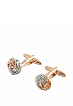 Paar Manschettenknöpfe mit gedrehtem Knoten-Design in Roségold- und Silbertönen mit strukturierter Details auf weißem Hintergrund.