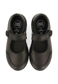 Zapatos Mary Jane negros de cuero con puntera redonda y una correa de Velcro. Suela de goma texturada y interior acolchado para mayor comodidad. Talla 26.