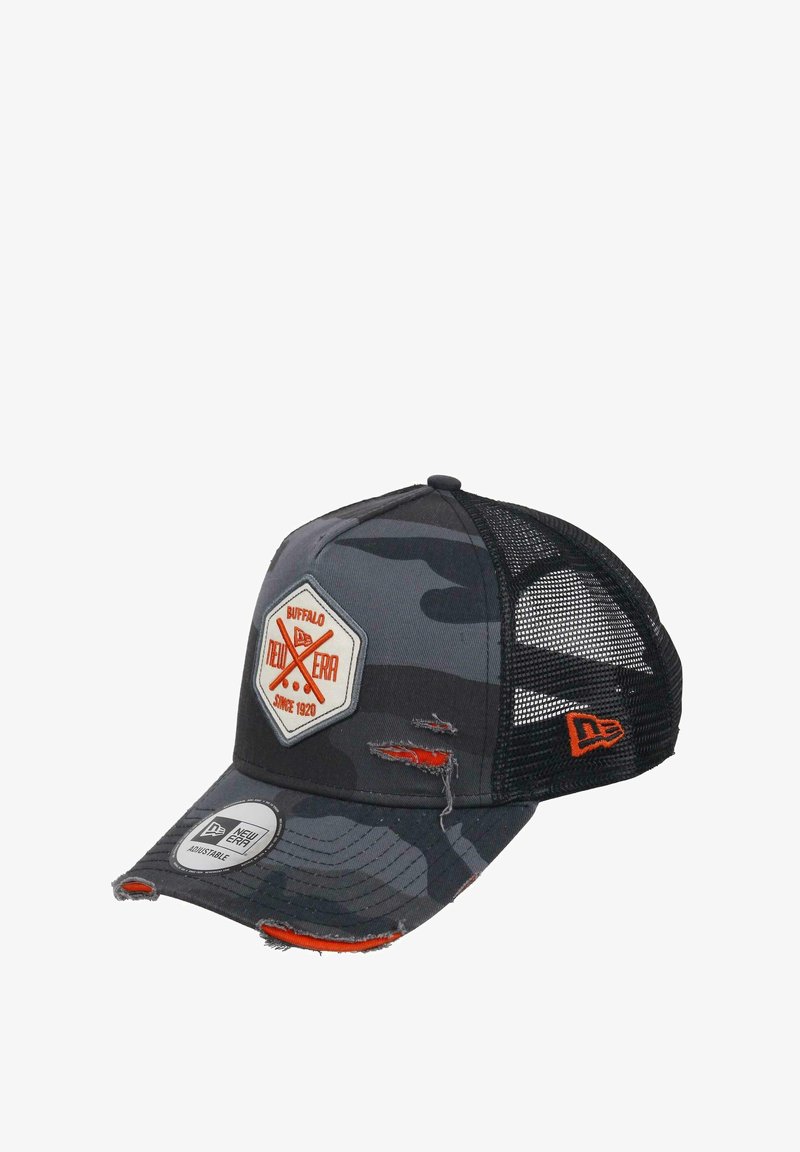 Black and gray camo trucker cap with a distressed front, mesh sides, and an embroidered logo. Features an orange accent on the right side.