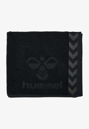 Black towel made of textured fabric, featuring a chevron design in a darker gray on one edge and a logo printed in the center.