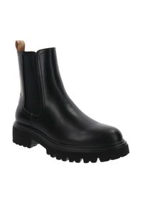 Botín Chelsea de cuero negro con paneles laterales de elastano, acabado texturizado y suela de goma gruesa con profundas ranuras para tracción.