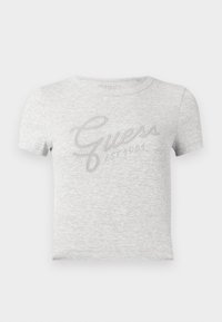Gray short-sleeve t-shirt with ribbed texture, featuring a metallic silver "Guess" logo and "EST 1981" text in a cursive font.